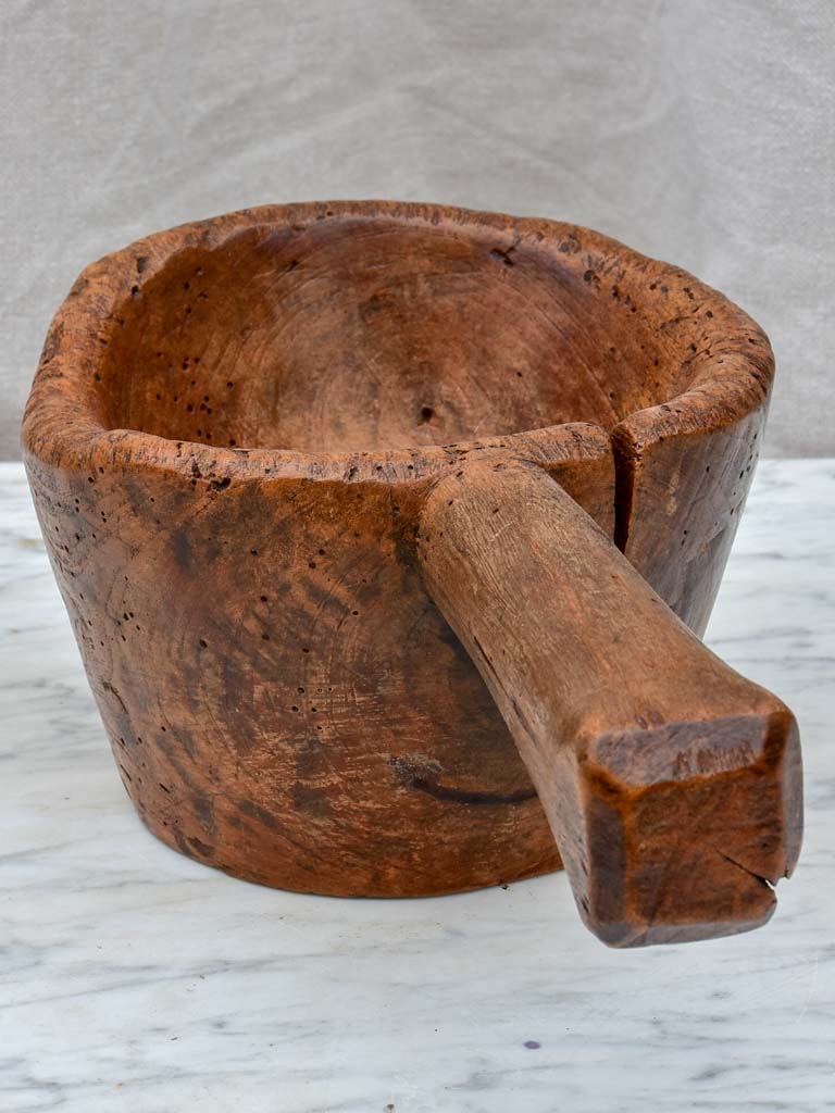 Primitive wooden bowl with handle