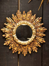 Vintage sunburst mirror with gilded carved frame
