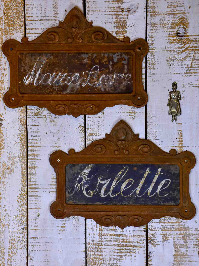 Two antique French cast iron signs from horse stables