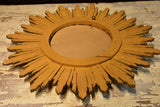 Vintage sunburst mirror with gilded carved frame