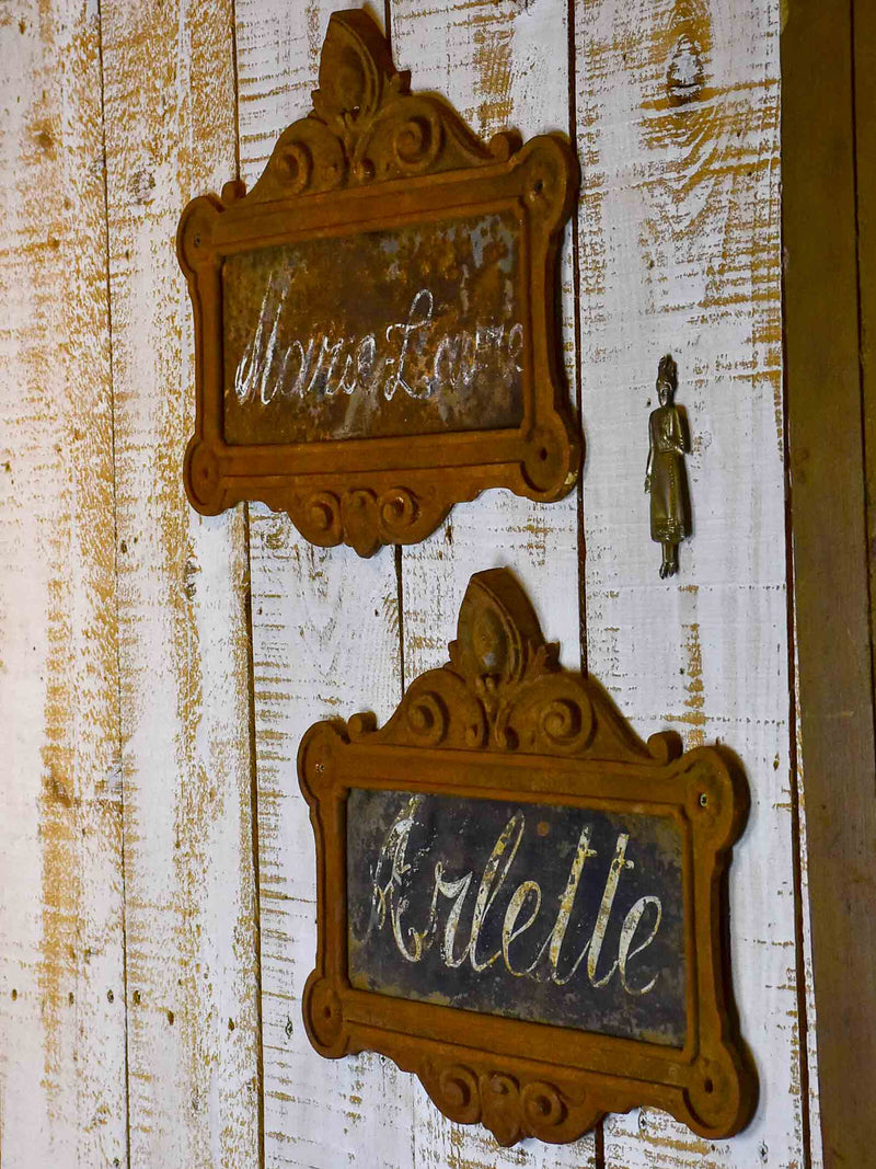 Two antique French cast iron signs from horse stables