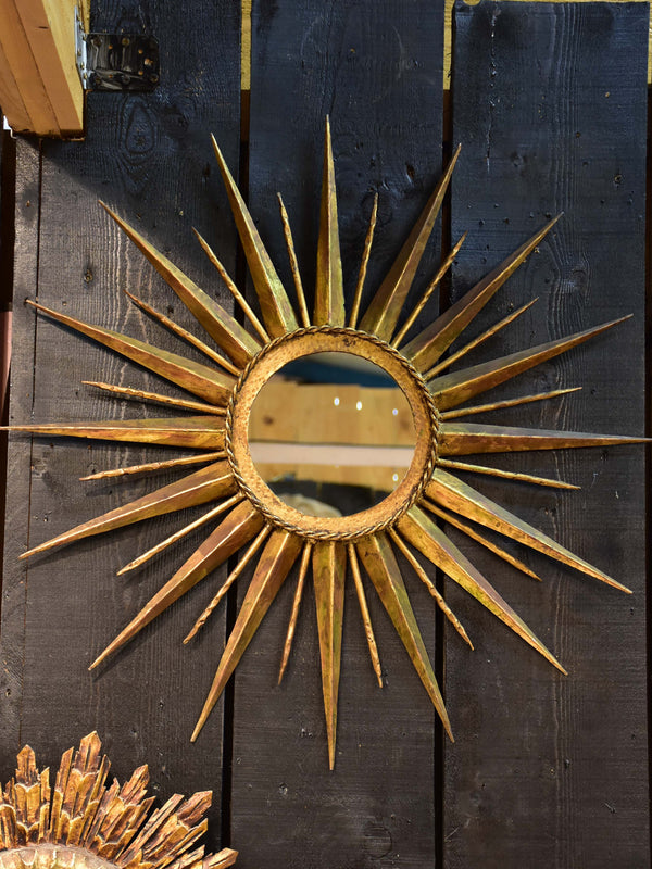 Vintage sunburst mirror with gilded metal frame