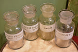 Four antique French apothecary glass jars