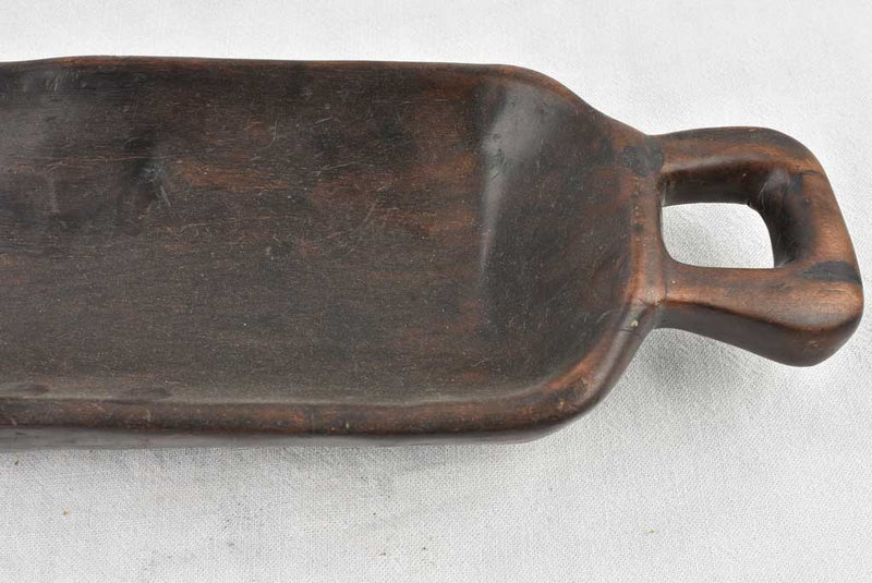 Long handled wooden bowl, folk design