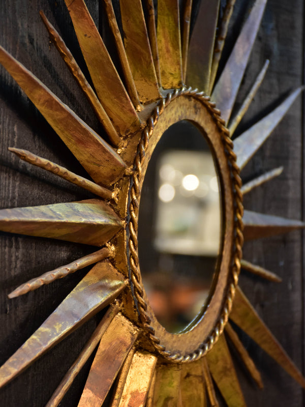 Vintage sunburst mirror with gilded metal frame