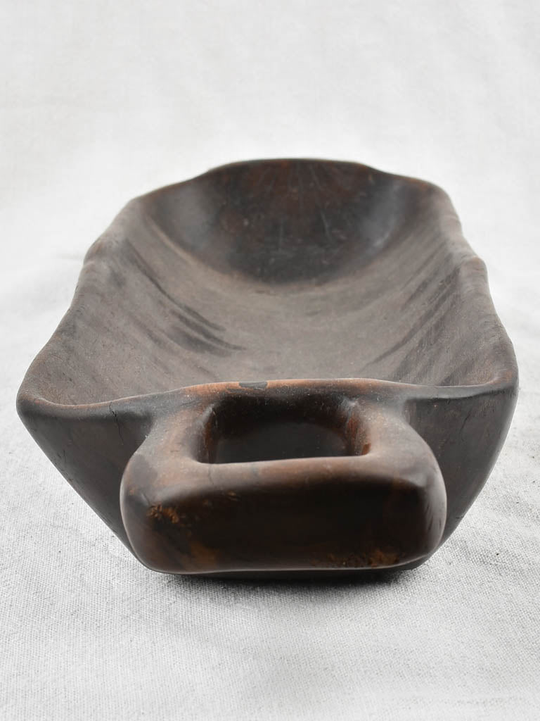 Unknown origin long, handcrafted wooden bowl