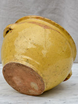 Antique French mixing bowl with yellow glaze