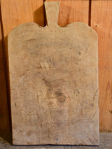 Antique French cutting board with rounded shoulders