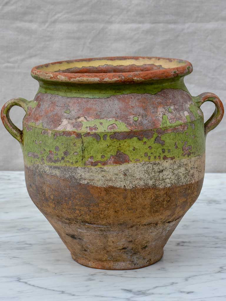 Rustic antique French confit pot with pale green glaze