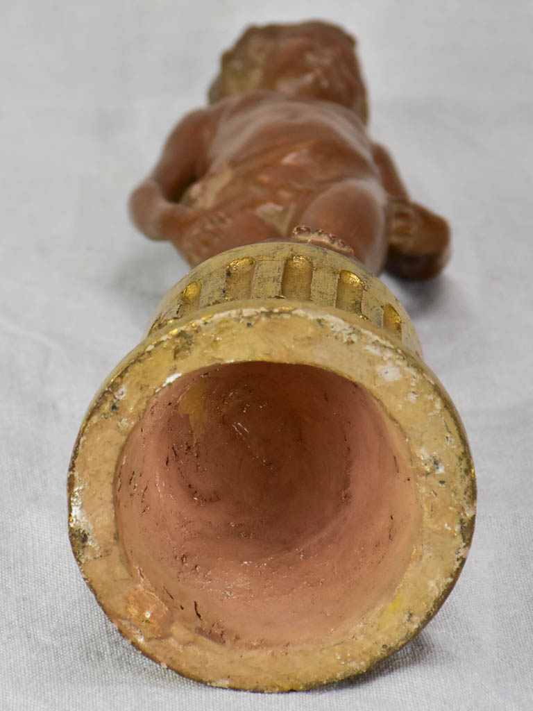 Eary 20th Century French terracotta sculpture of a boy on a gilded column - signed