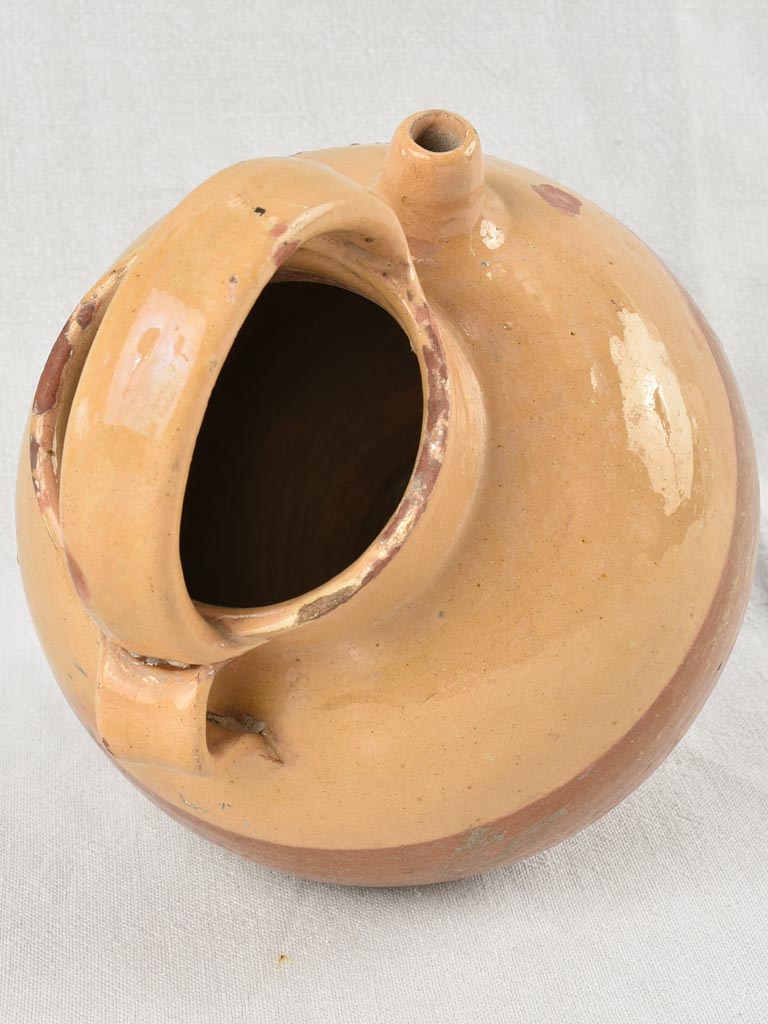 Antique French water pitcher with yellow / peach glaze 11¾"