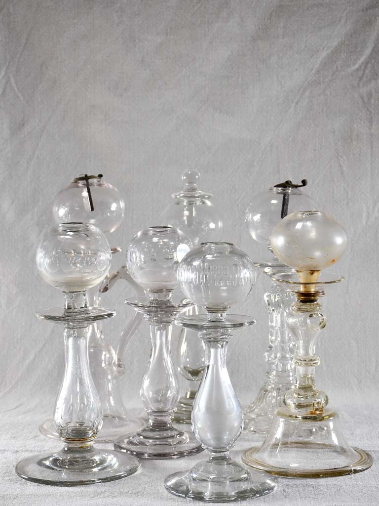 Rare collection of seven blown glass oil lamps - 18th and 19th century
