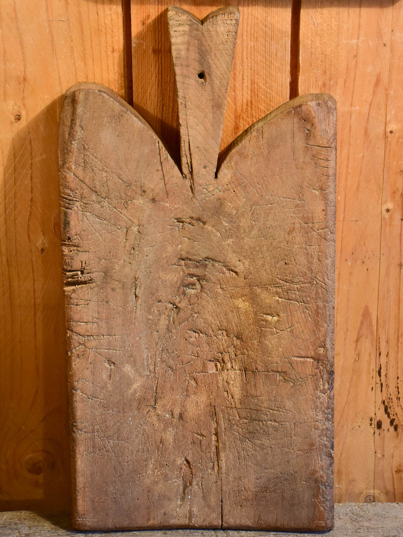 Antique French cutting board with wedge handle