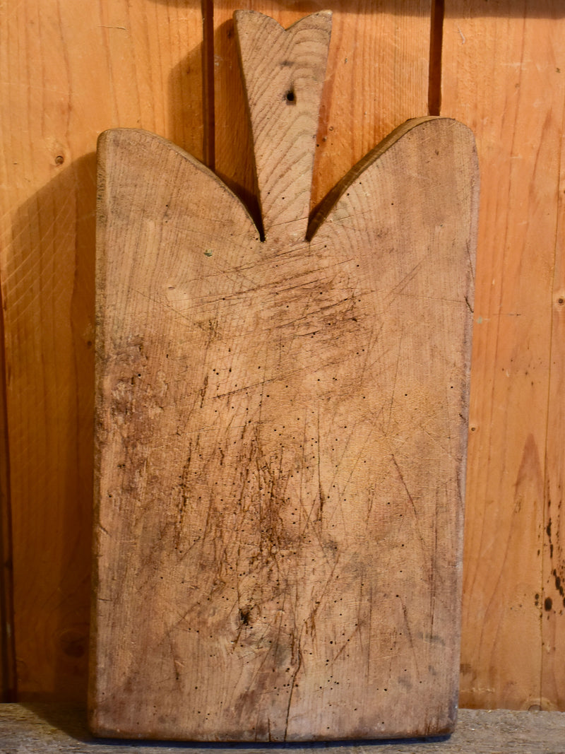 Antique French cutting board with wedge handle