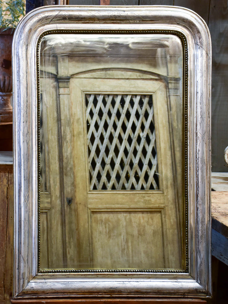 Antique French Louis Philippe mirror with silver leaf frame