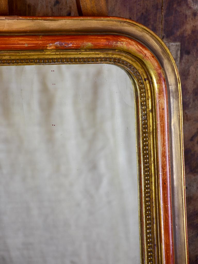 Antique French Louis Philippe mirror with timeworn gilt frame 22" x 29 ½"