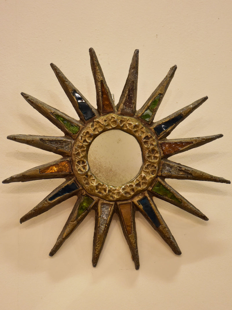 Bronze and lead light sunburst mirror - Line Vautrin style