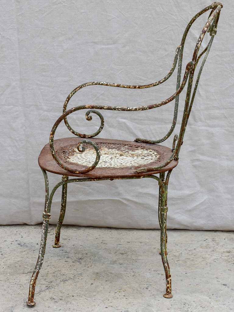 RESERVED LM Antique French garden armchair with perforated seat and green patina
