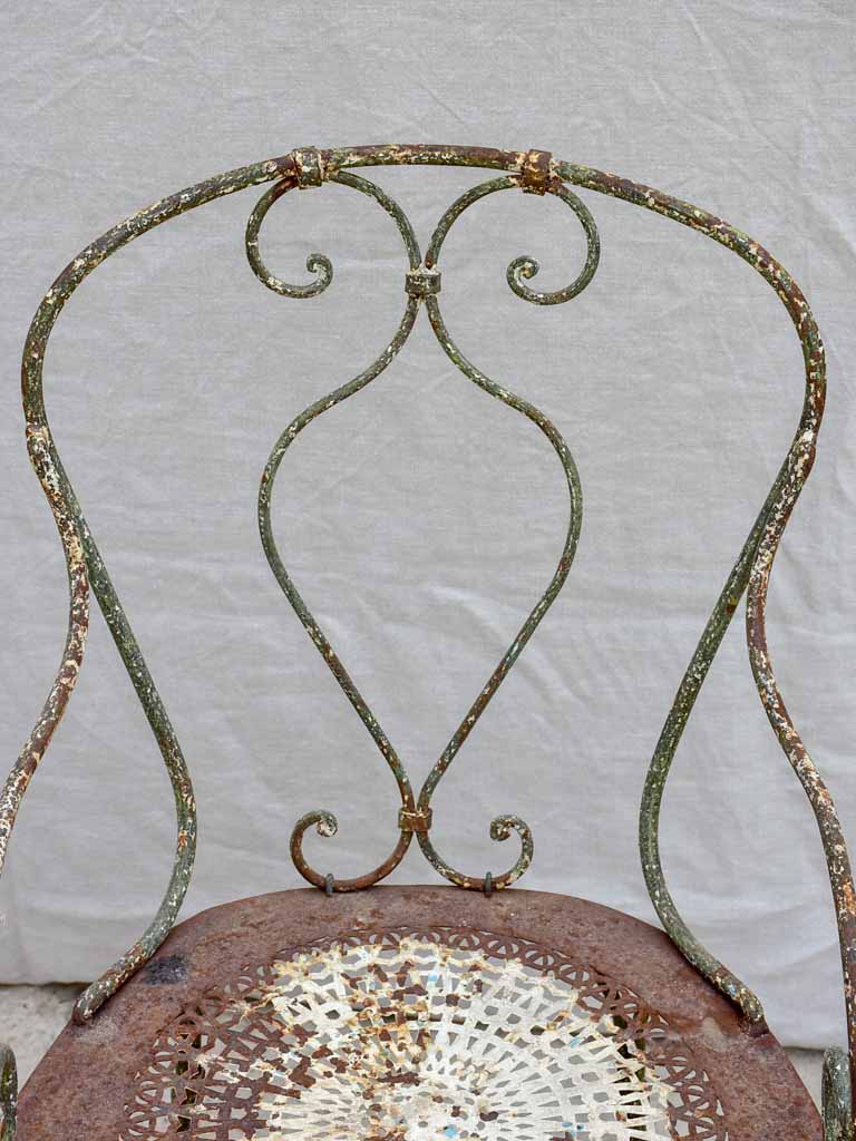 RESERVED LM Antique French garden armchair with perforated seat and green patina