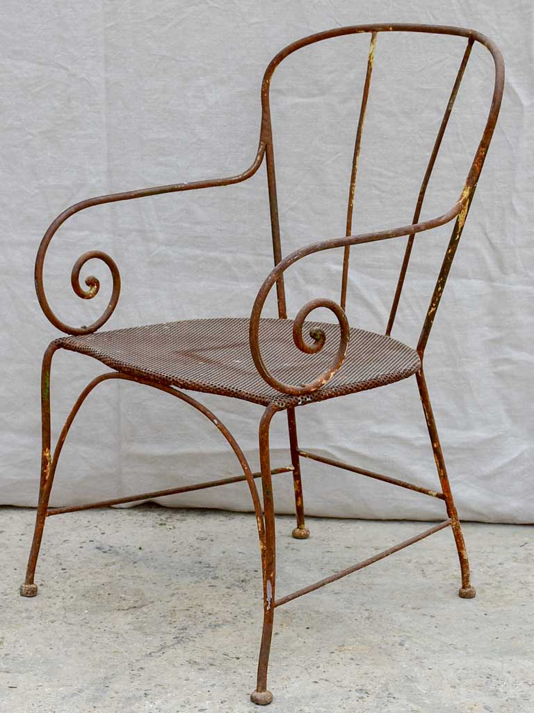 Antique French garden armchair with bar backrest and perforated seat