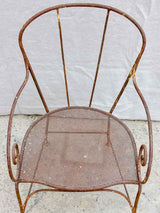 Antique French garden armchair with bar backrest and perforated seat