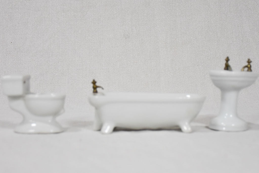 Unique porcelain miniature bath replicas