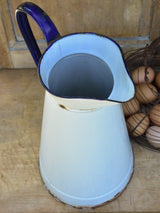 1920's enamel pitcher with blue rim