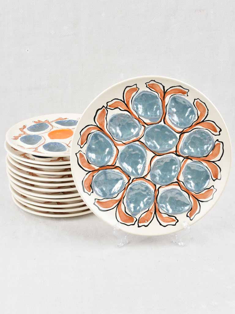 Set of 11+1 handpainted oyster plates - Calypso