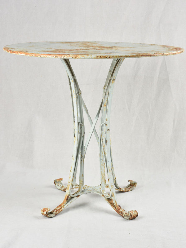 Round French garden table with pretty riveted base 31½"