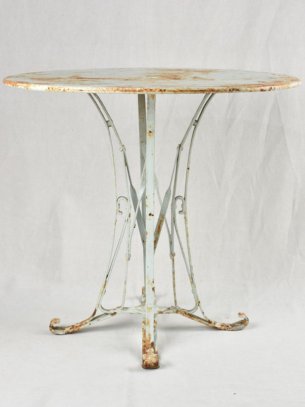 Round French garden table with pretty riveted base 31½"