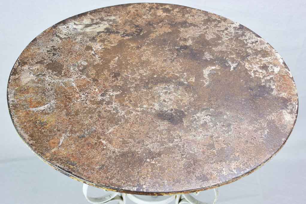 Mid century French garden table with pretty base and thick iron top