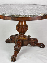 Early twentieth-century Napoleon III round center table with black marble top and claw feet 38¼"