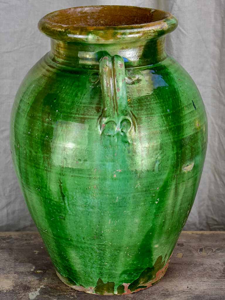 Antique French terracotta olive jar with green glaze