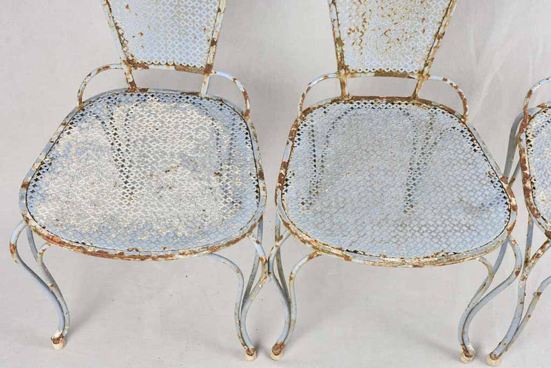 Set of six 1950s perforated garden chairs with lavender blue patina