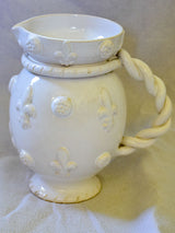 1960's Émile Tessier white ceramic pitcher with fleur de lys