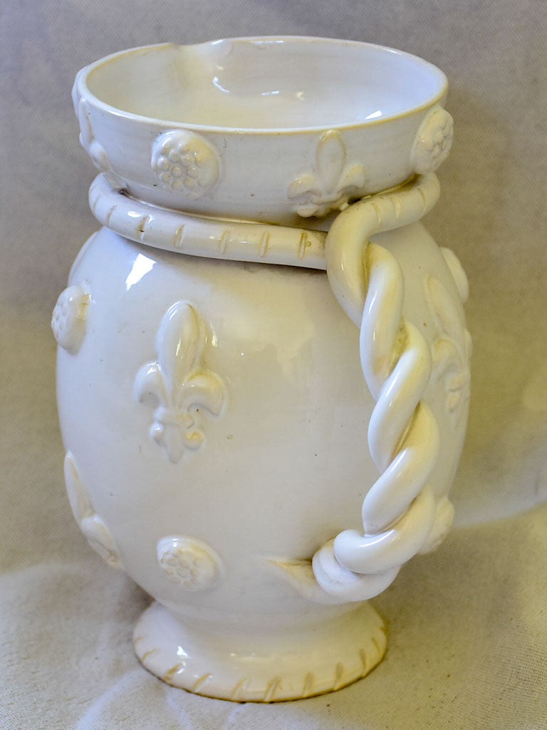 1960's Émile Tessier white ceramic pitcher with fleur de lys