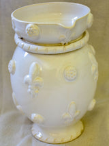 1960's Émile Tessier white ceramic pitcher with fleur de lys