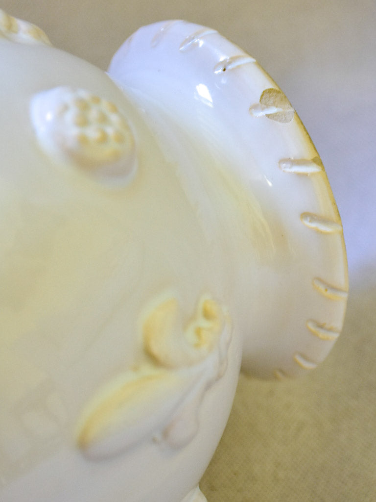 1960's Émile Tessier white ceramic pitcher with fleur de lys