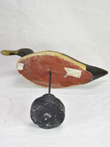 Collection of five hunting decoy ducks mounted on wooden blocks