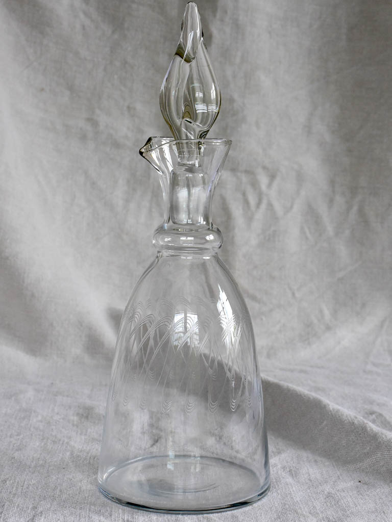 Mid century carafe with engraving and twisted stopper