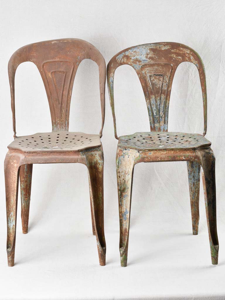 Weathered useable stackable Tolix chairs