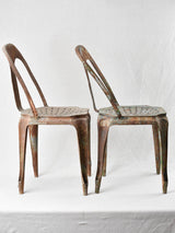 Old-world Tolix style metal chairs