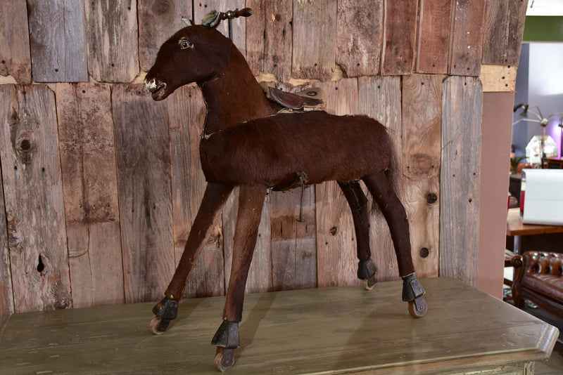 Antique French toy horse with moving mechanism