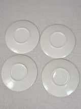 Four vintage blue and white saucers 5"