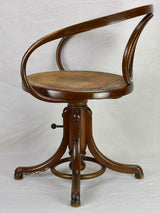 Antique French wooden Thonet armchair with cane seat