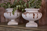 Two vintage French garden urns with white patina