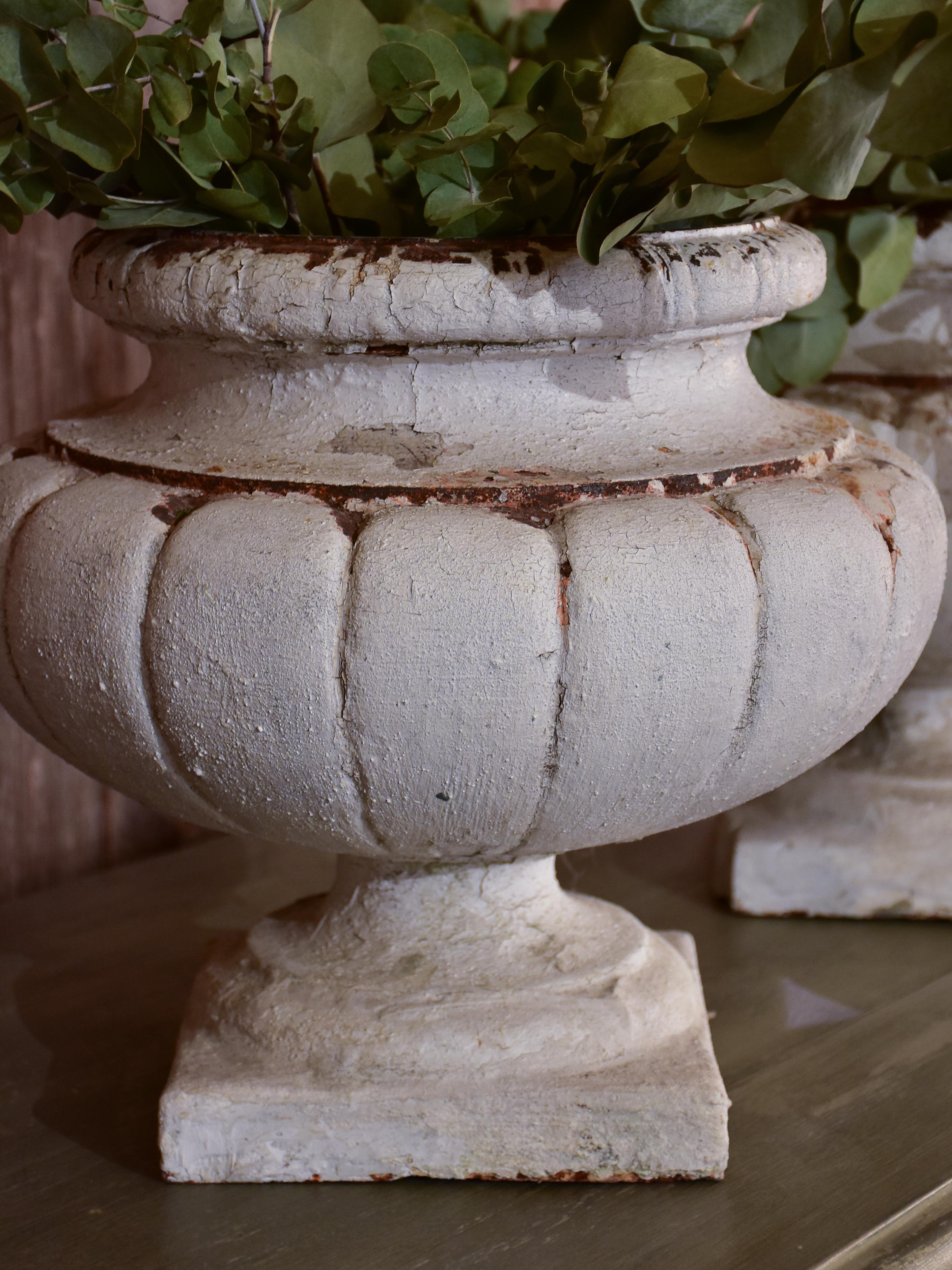 Two vintage French garden urns with white patina