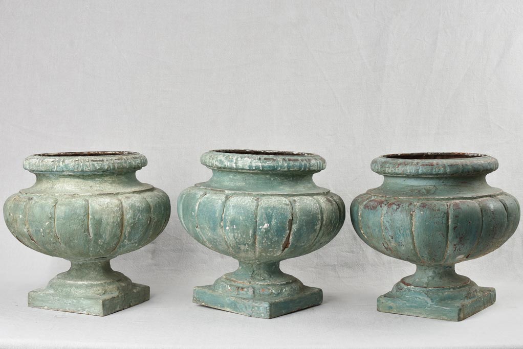 Collection of 3 cast iron garden planters 15"