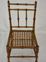 Miniature antique French chair with bamboo frame and cane seat