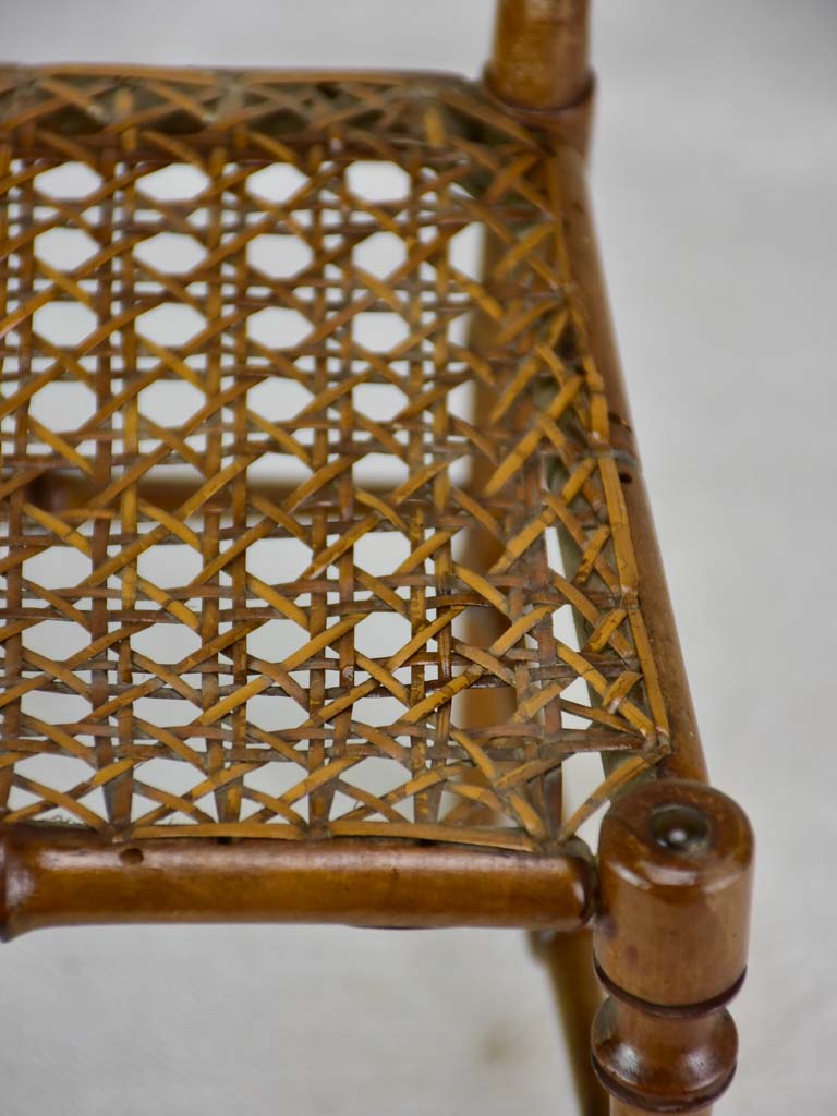 Miniature antique French chair with bamboo frame and cane seat